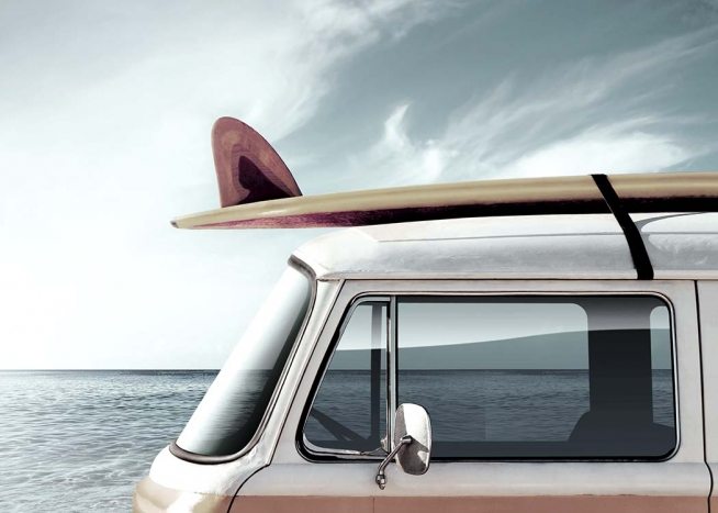 - Vintage poster with an old VW camper van and a surfboard on the roof and the vast seas in the background.