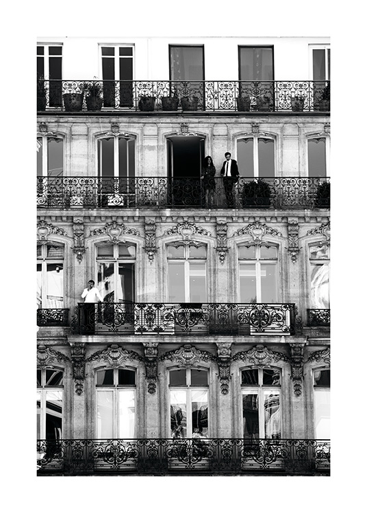 - Black and white photo poster of building balconies in Paris.