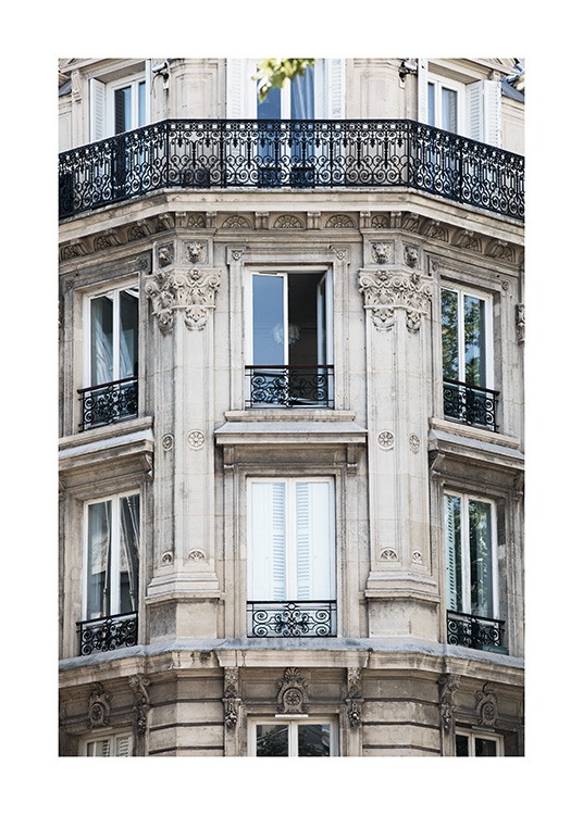 - Beautiful photo showing the intricate details and ornate finish of the outside wall of a building in Paris.