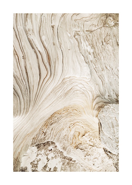  – Photograph of a beige cliff with a swirling, abstract pattern