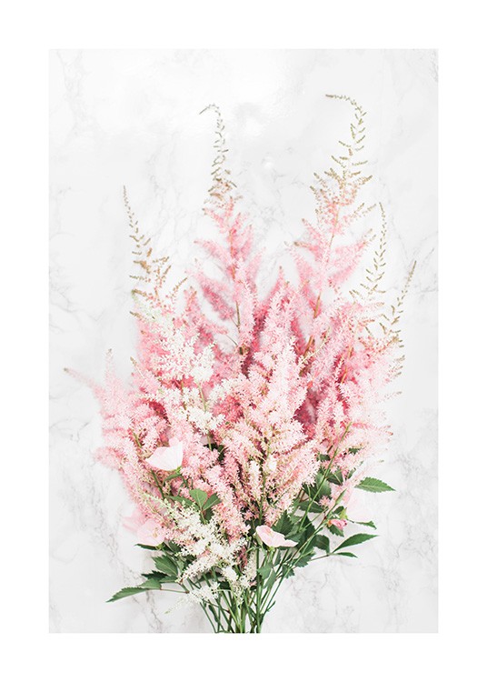 Pink bouquet with pink flowers and green leaves on a background with a marble pattern