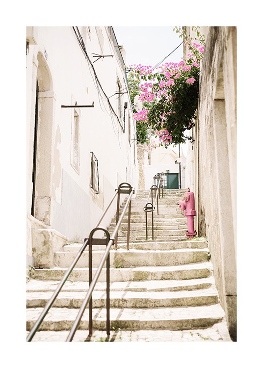 Long flight of steps in Lisbon with pink flowers and a pink fire hydrant
