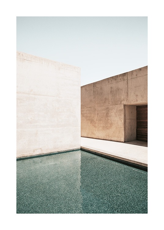  – Photograph of concrete buildings with a large pool in front