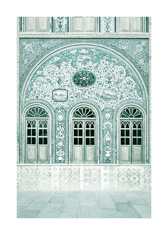 Photograph of mint facade with mosaic pattern and mint doors