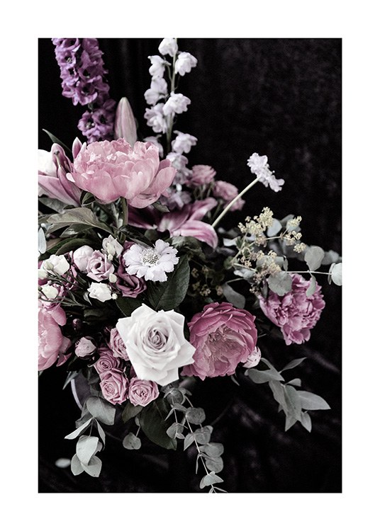  - Flower bouquet with white, pink and purple flowers and green leaves with a dark background