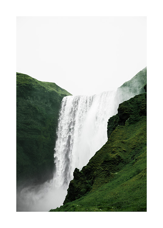  - Photograph of green landscape surrounding Skogafoss waterfall in Iceland