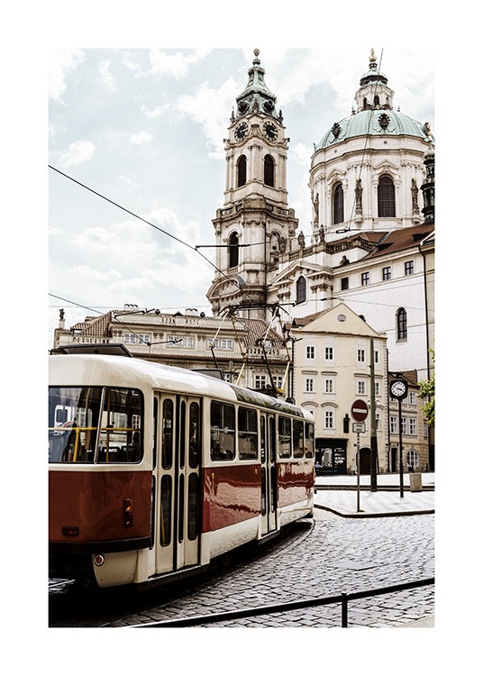  - Photograph from Prague of an old red tram in front of a white church