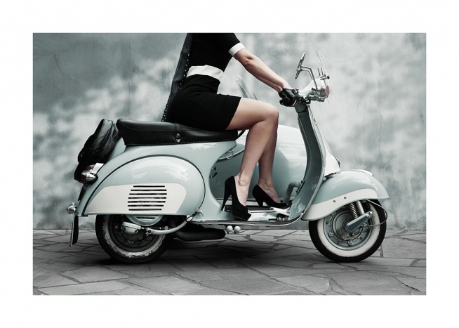  - Photograph of a woman in a black dress on a pastel coloured vintage scooter