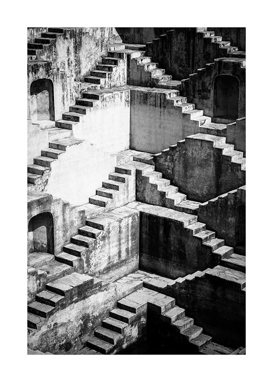  - Black and white photograph of walls with staircases next to them