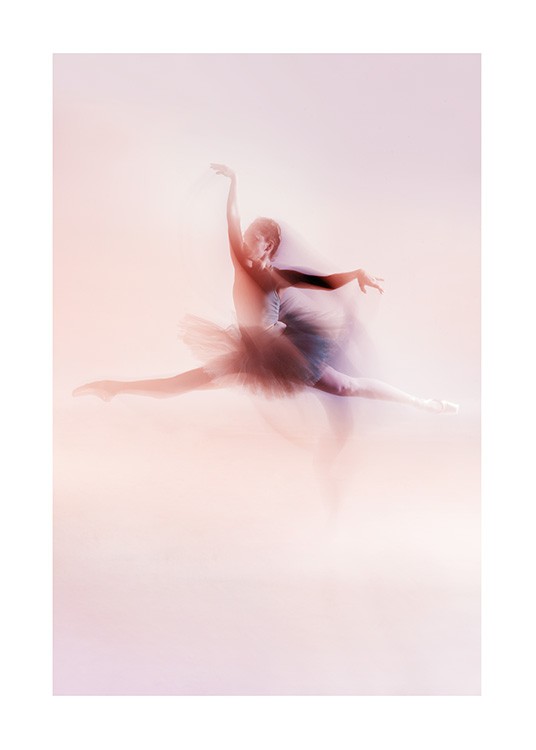  - Photograph of a ballerina in pink jumping into the air, whilst wearing a tulle skirt