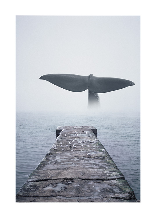  - Photograph with a whale tail in the ocean and a pier leading into the water