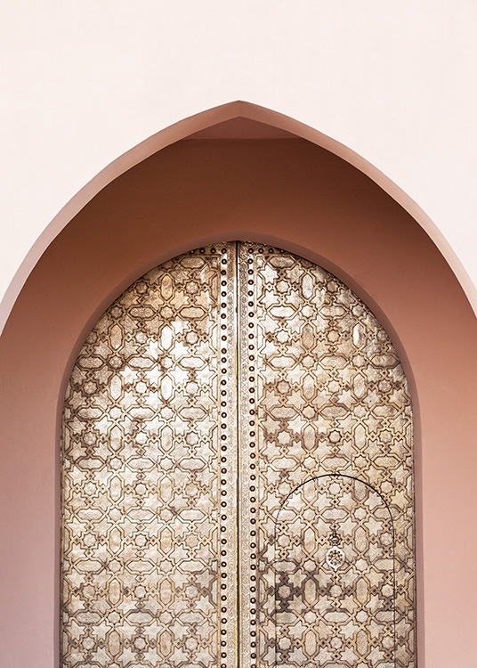  - Photograph of a pink arch in front of a golden, oval door