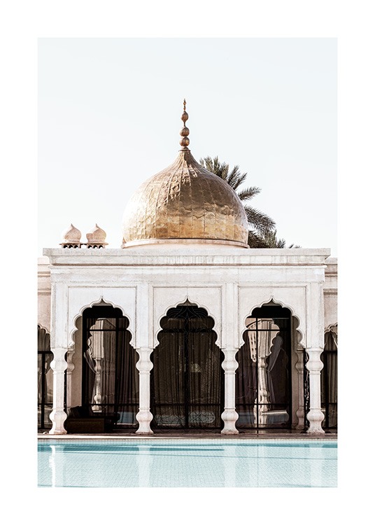  - Photograph of a white building with curved arches and pillars and a gold dome on the top