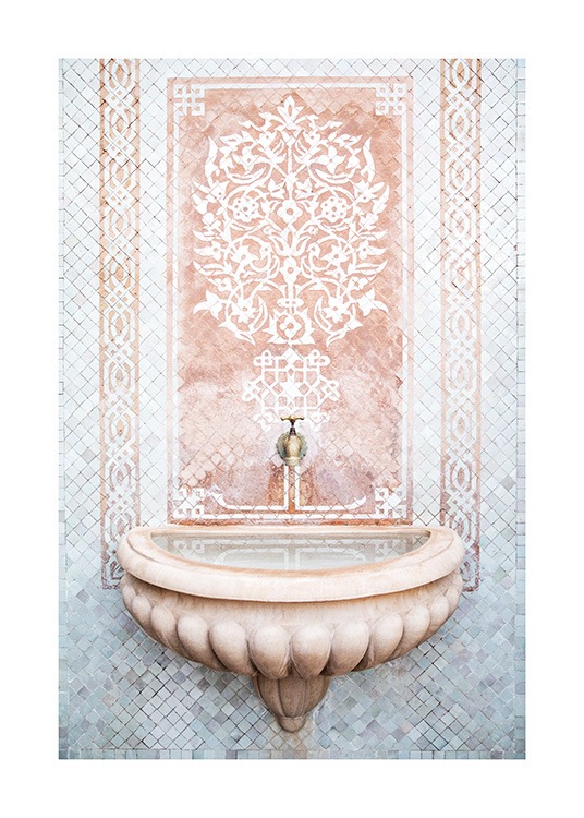  - Photograph of a mosaic wall in blue, pink and white behind a small fountain