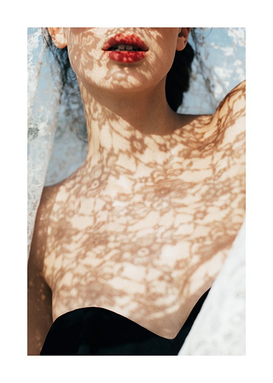  – Photograph of a woman with lace shadows on her chest and face