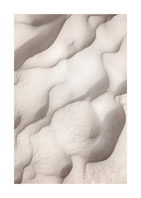  – Photograph of beige sand forming abstract shapes