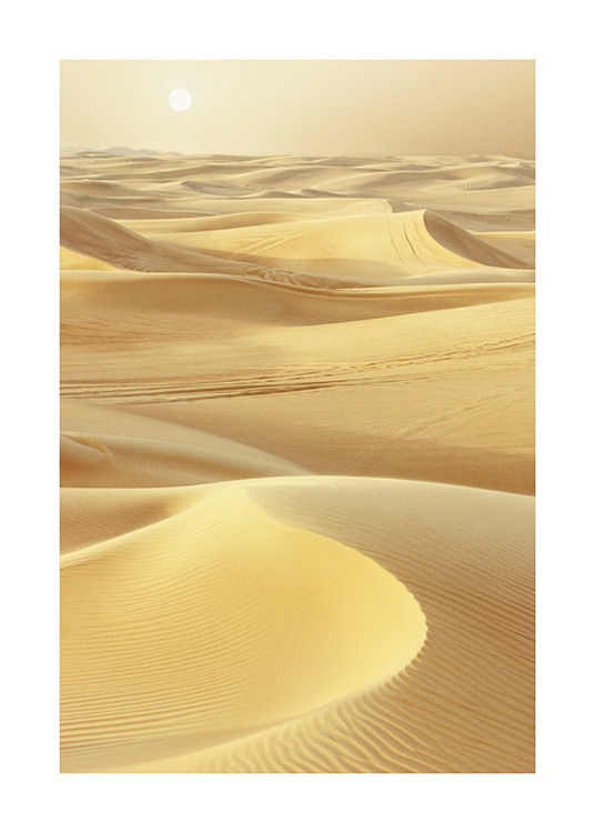  – Photograph of a desert with yellow sand and the sun in the background