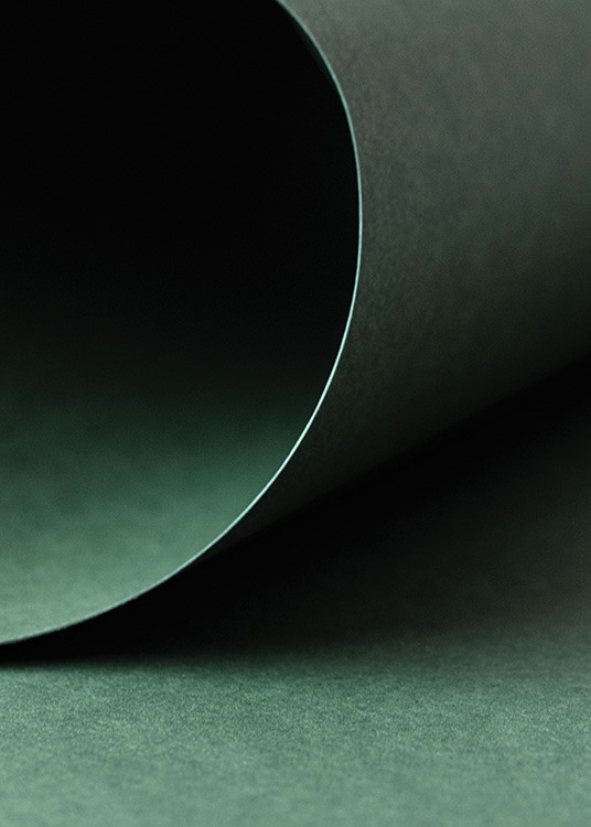  – Photograph of a dark green paper that's been rolled up
