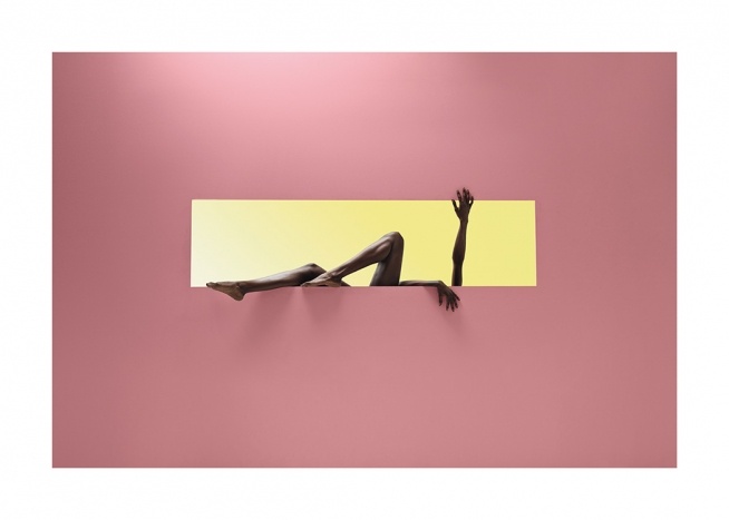  – Photograph of a woman in a yellow rectangle against a pink background, stretching her arms and legs out