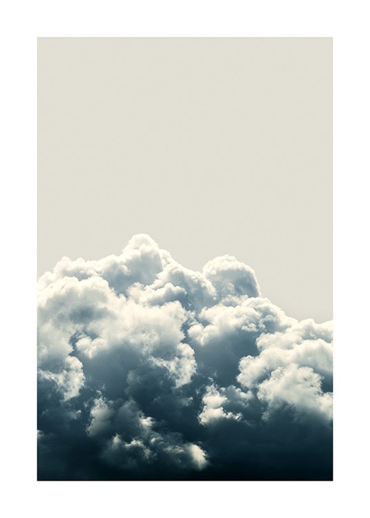  – Photograph of stormy clouds in grey and white with a light beige sky in the background