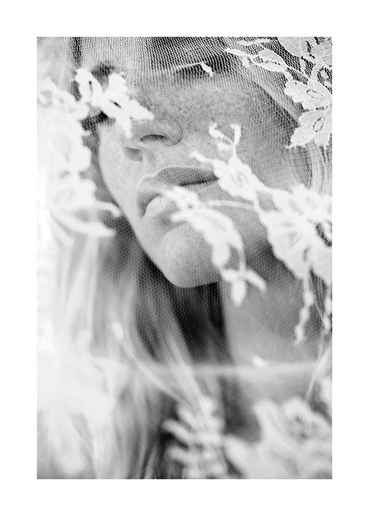  – Black and white photograph of lace covering a woman's face
