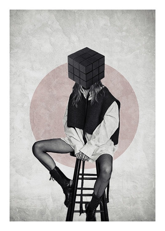  – Woman in black and white sitting on a stool, with her head covered by a black cube