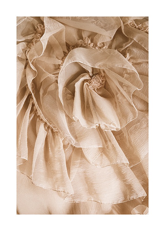  – Photograph of ruffled tulle fabric in beige, resembling a flower