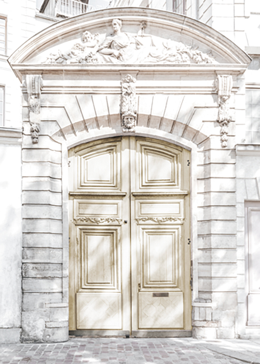  – Photograph of a light yellow door in a marble building with antique carvings