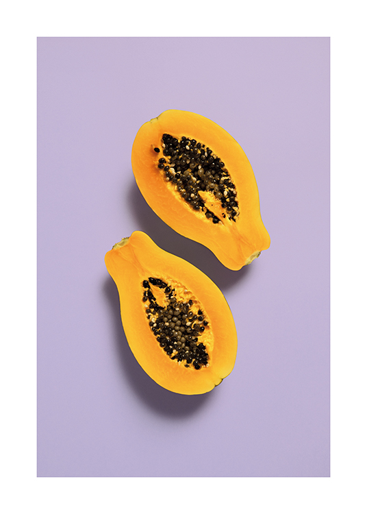  – An image of a freshly cut papaya on a lilac background