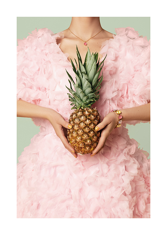  – An image of a woman in a pink dress holding a pineapple