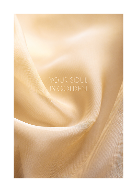  – Photograph of fabric in a soft gold tone with a quote written in the middle