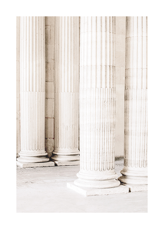  – Photograph of a group of light, large pillars with carvings