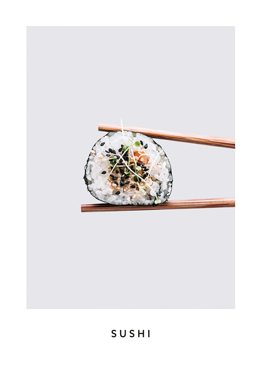  – Photograph of a pair of sushi sticks holding a maki sushi piece against a background in grey