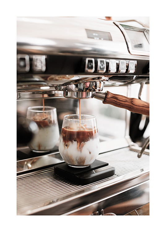  – Photograph of a glass of ice coffee being poured from a coffee machine