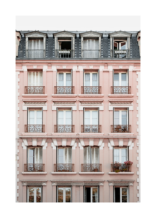 – Photograph of a Parisian pink house with french balconies and windows