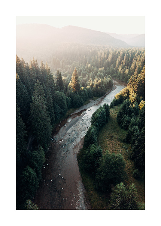 – A magnific photograph of a river in the forest from above. You can spot the last sun lights on the top of the print