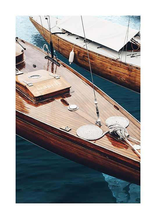 – Two wooden boats on the water
