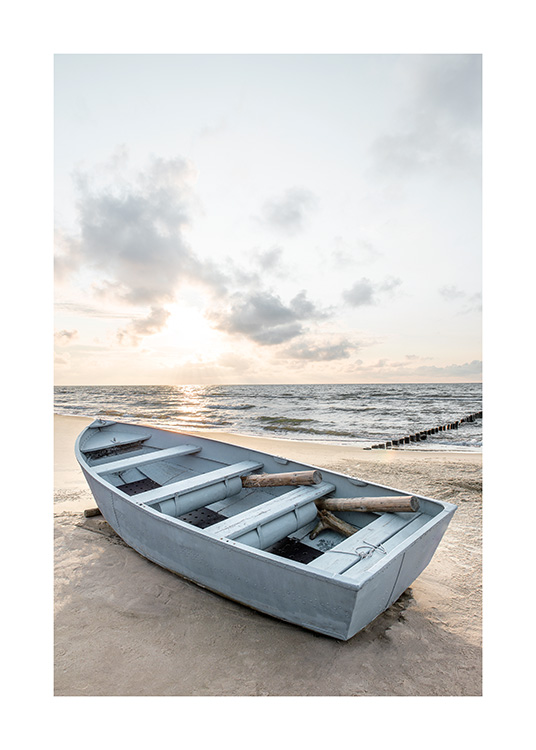 – Photography of a fishing boat on the beach 