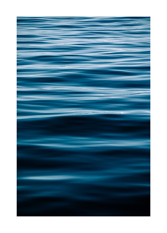  - Photograph of a blue ocean with still waves flowing
