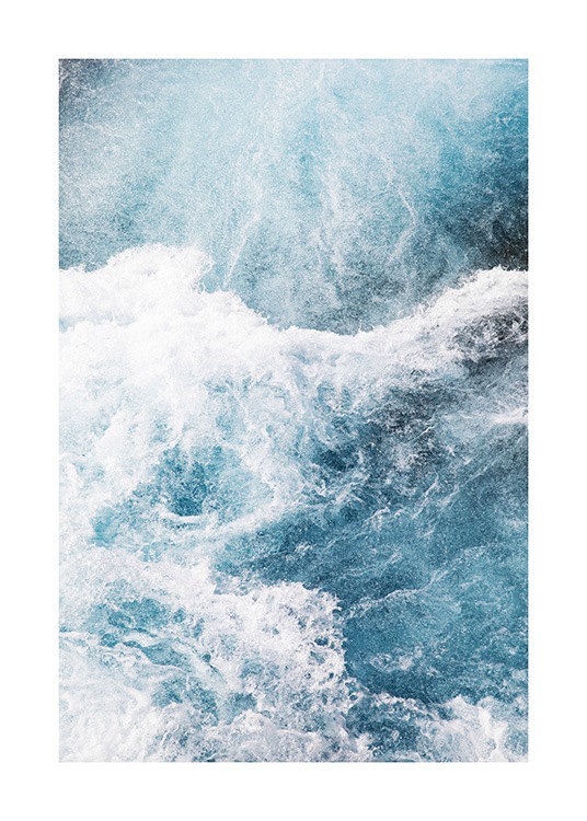  - Photograph with aerial view of a blue ocean with sea foam
