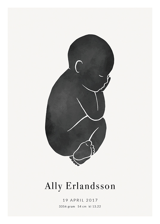  – A baby in black against a light grey background with text underneath
