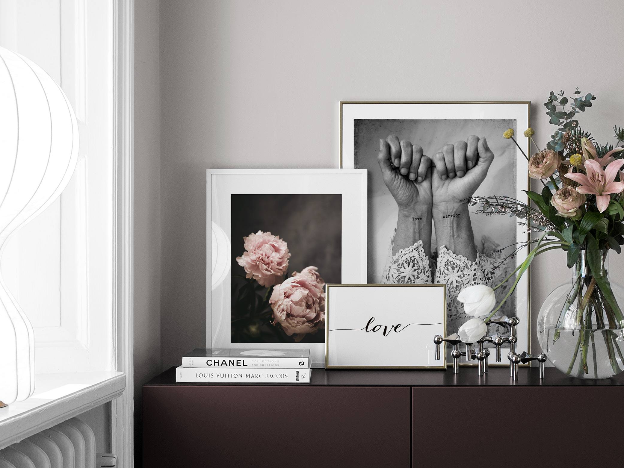 Romantic feminine decoration to the hall with floral prints and love posters