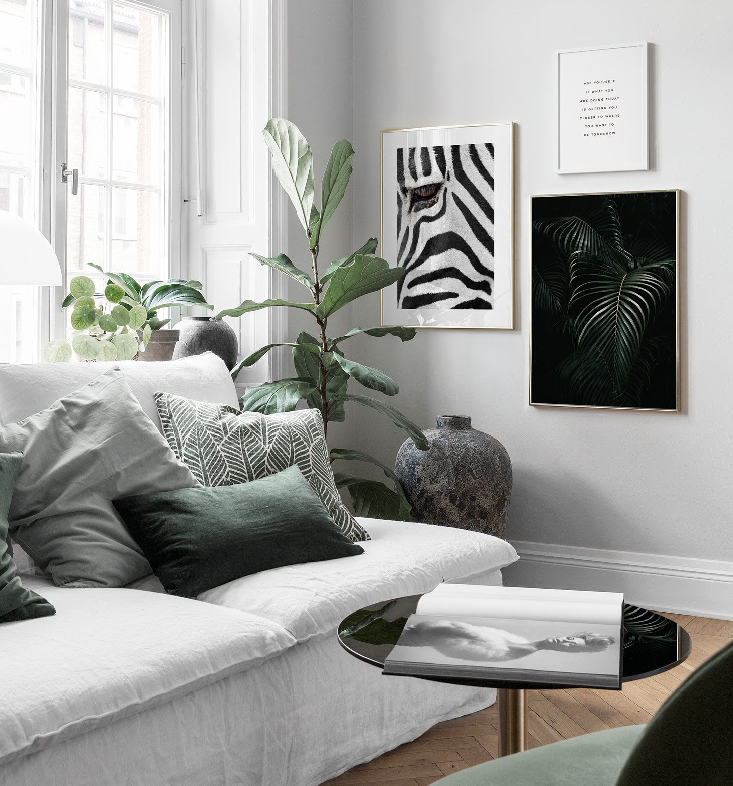 Green living room with tropical theme and animal posters