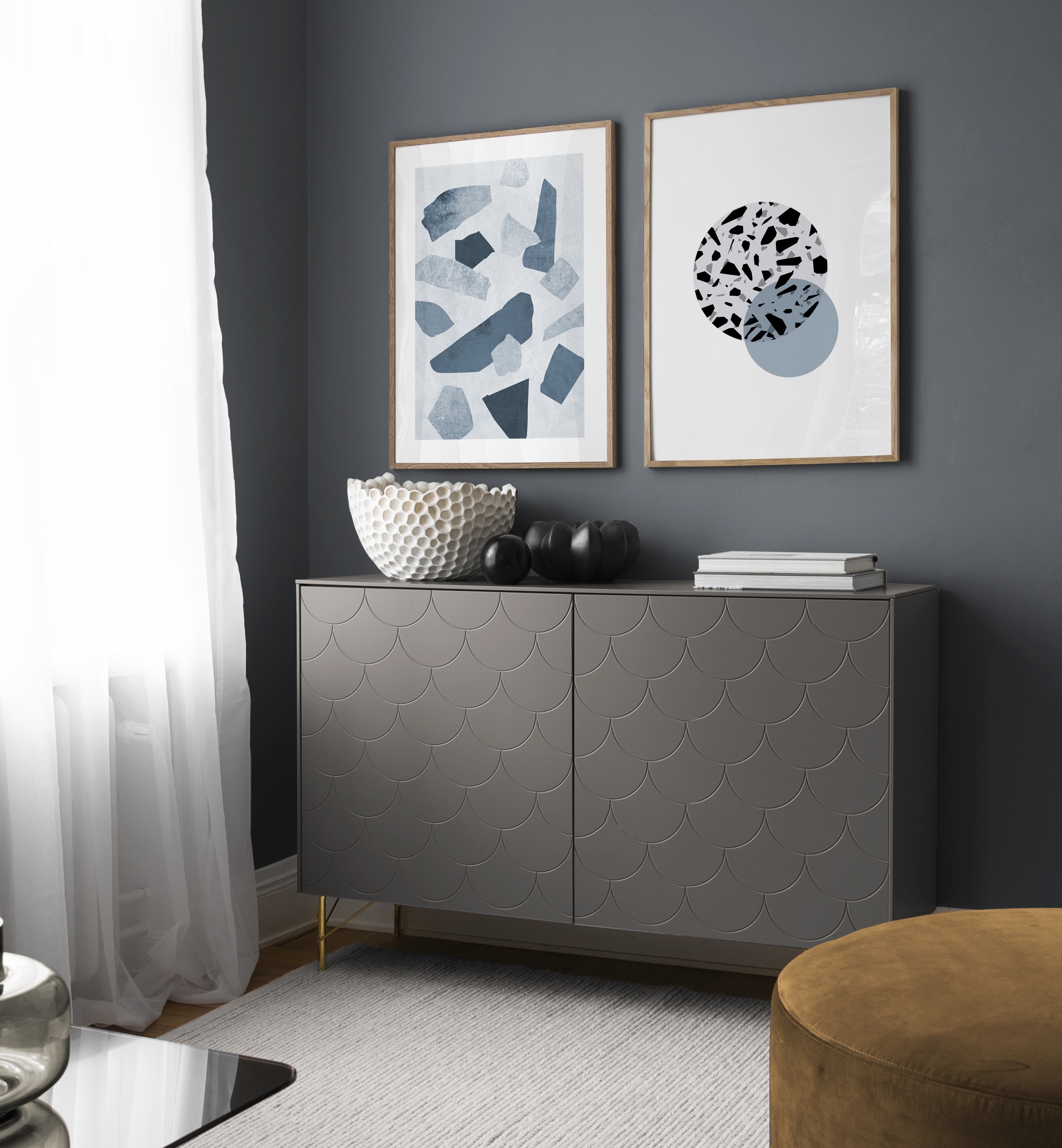 Posters with graphic patterns in pairs, living room in blue tones