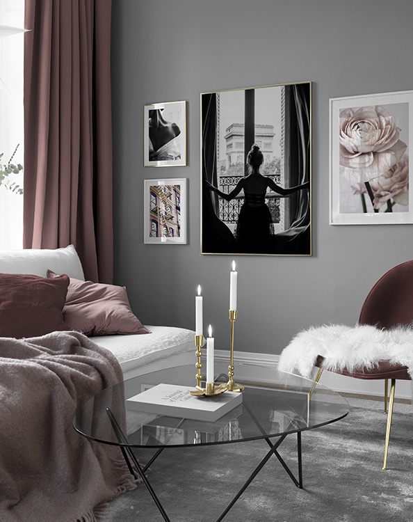 Classic elegant living room with pink and black-and-white posters