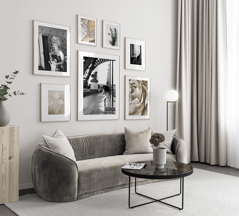 Black-and-white photo art and gold floral designs in living room